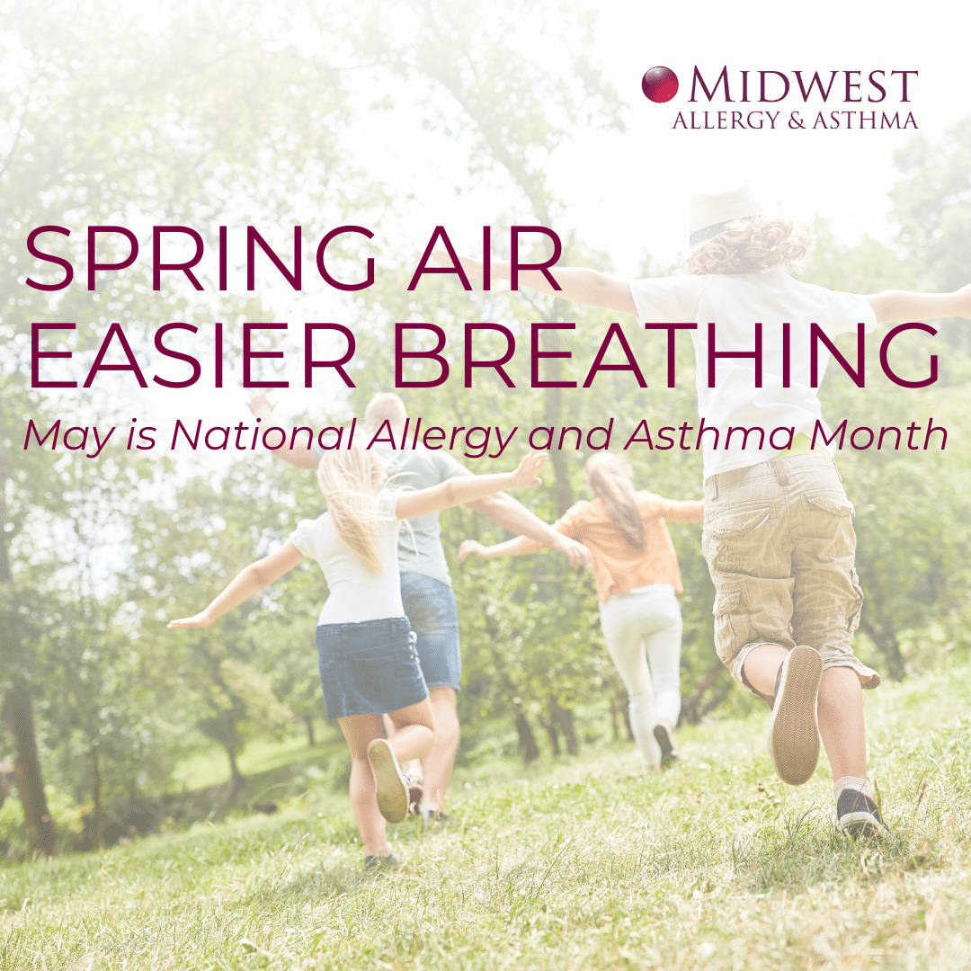 A group of children and adults run joyfully through a sunny green field with arms outstretched. Text reads: 'Spring Air, Easier Breathing. May is National Allergy and Asthma Month.' Midwest Allergy & Asthma logo appears in the top right corner